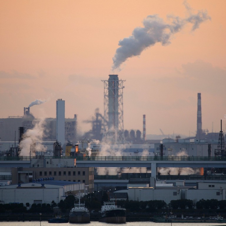 Japan lowers target for greenhouse gas emission cuts after Fukushima