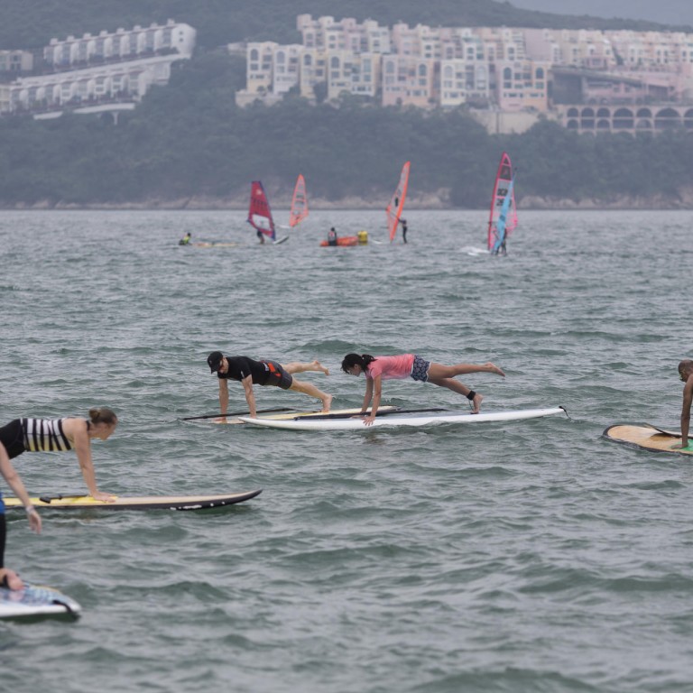 Pilates And Stand Up Paddle Boarding Combine For New Workout