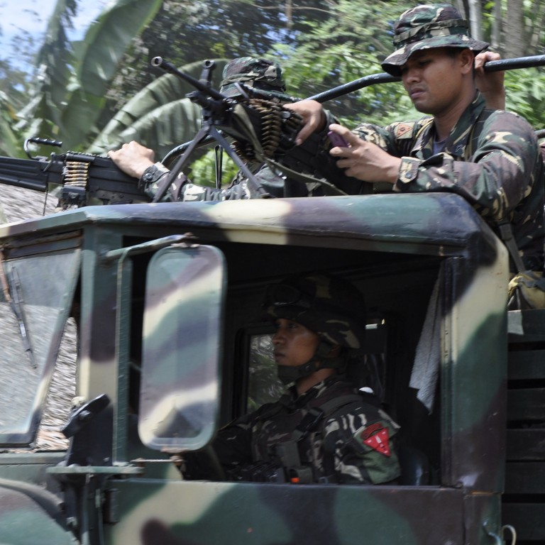 Bomb blast on bus in Philippines by suspected Abu Sayyaf militants ...