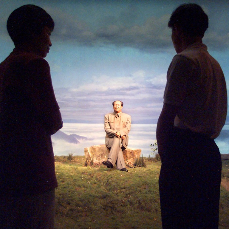 Beijingers view a wax model of Mao Zedong at the Museum of Chinese Revolution in Beijing. Photo: AFP