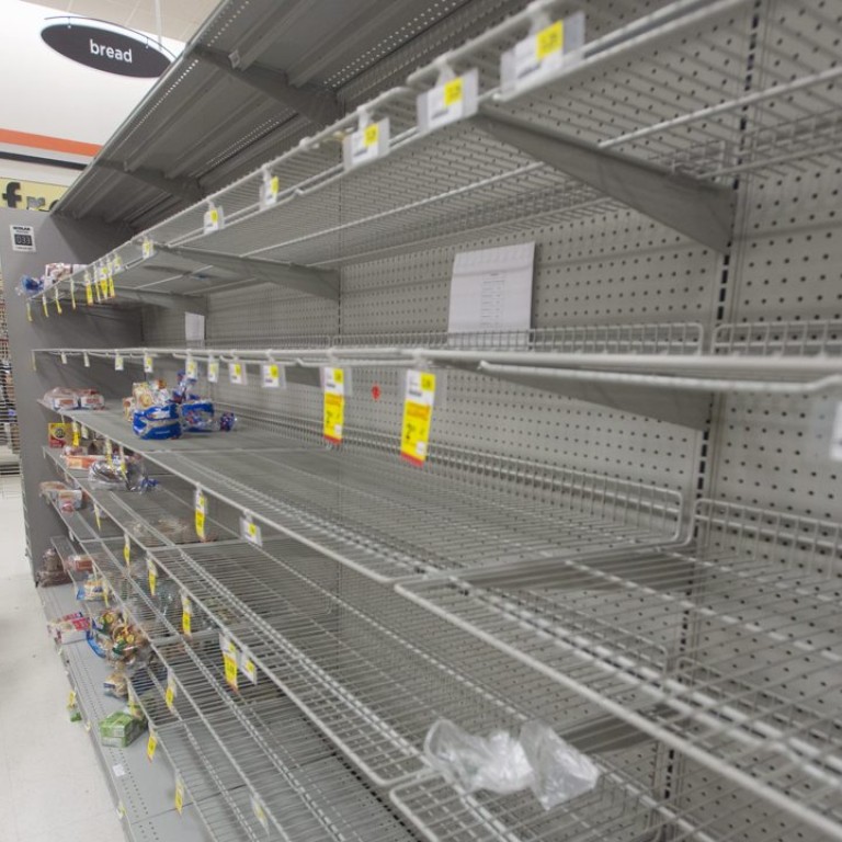Supermarket shelves stripped bare as millions brace for massive US