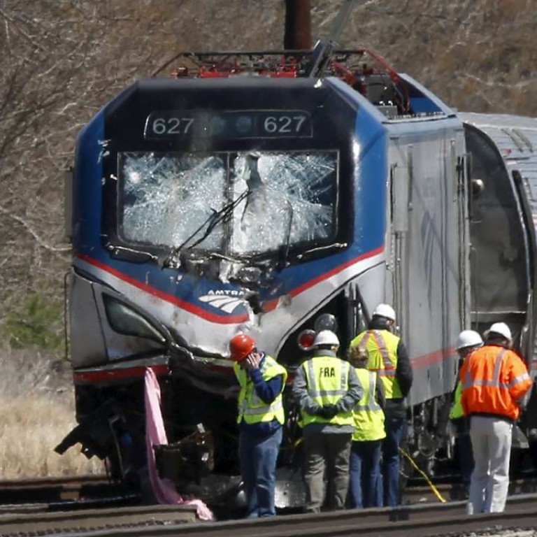 Two dead after Amtrak train smashes into backhoe on tracks near ...