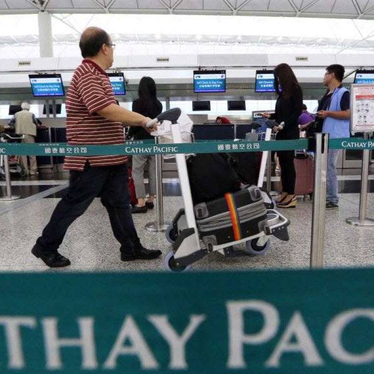 checked baggage size cathay pacific