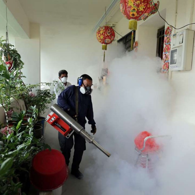 Singapore mass sprays residences as Zika infections rise to over 50