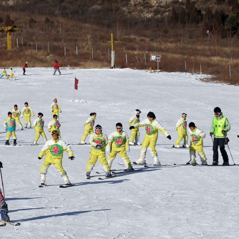 Chinese Children Take Up Snow Sports In Run Up To Hosting 2022