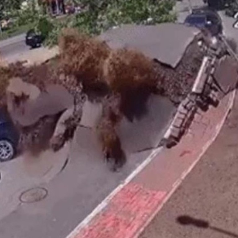 Watch incredible moment water pipe explodes after inflating carpark