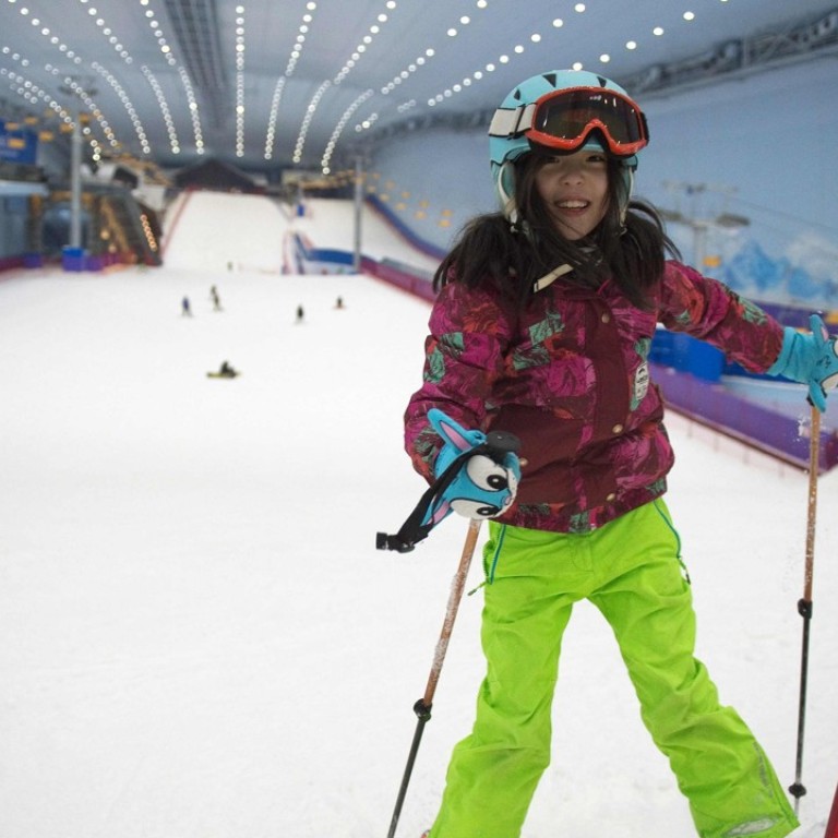 Chinese skiers cool off at world s largest indoor ski park as