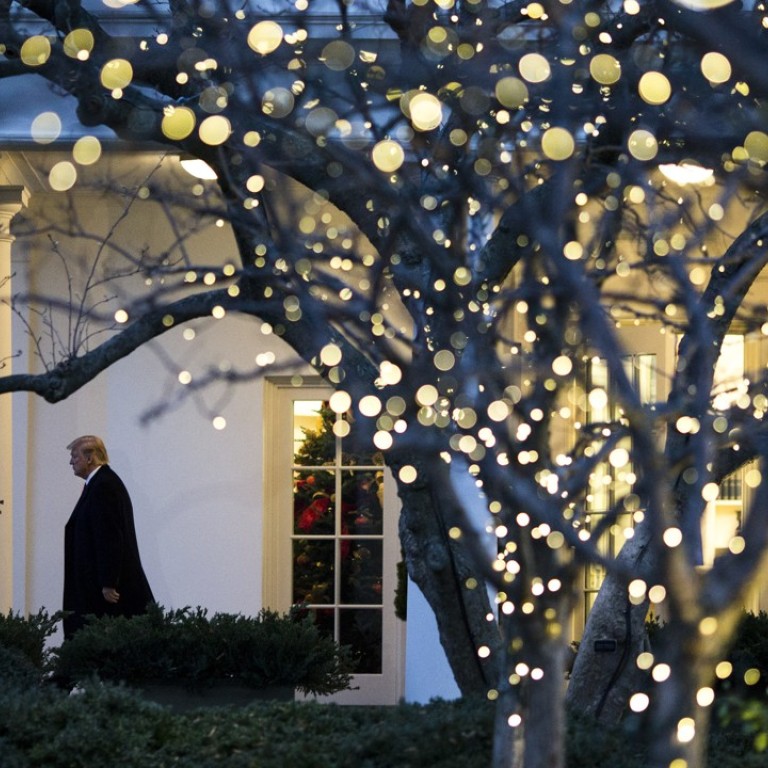 US President Donald Trump walks out of the Oval Office on Friday. The White House supports tweaking final tax legislation to appease lawmakers who want to let constituents deduct state income taxes, according to the National Economic Council Director. Photo: Bloomberg