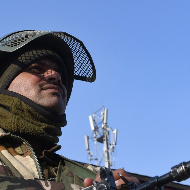 An Indian paramilitary trooper is seen in Kashmir on Monday. The country is investing US$553 million into buying guns for border protection, six months after a stand-off with China on its borders. Photo: AFP