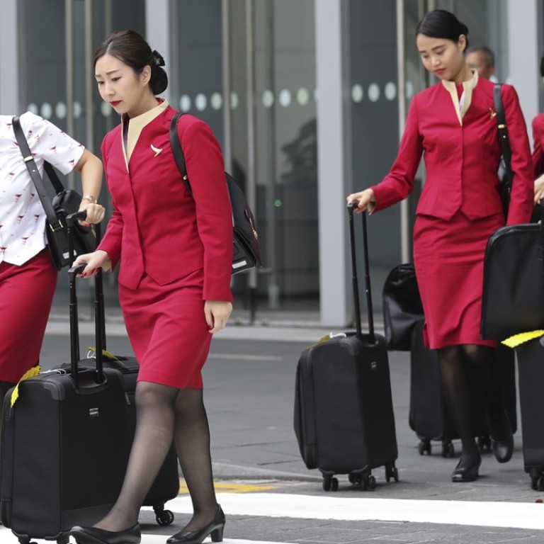 cathay pacific hand baggage