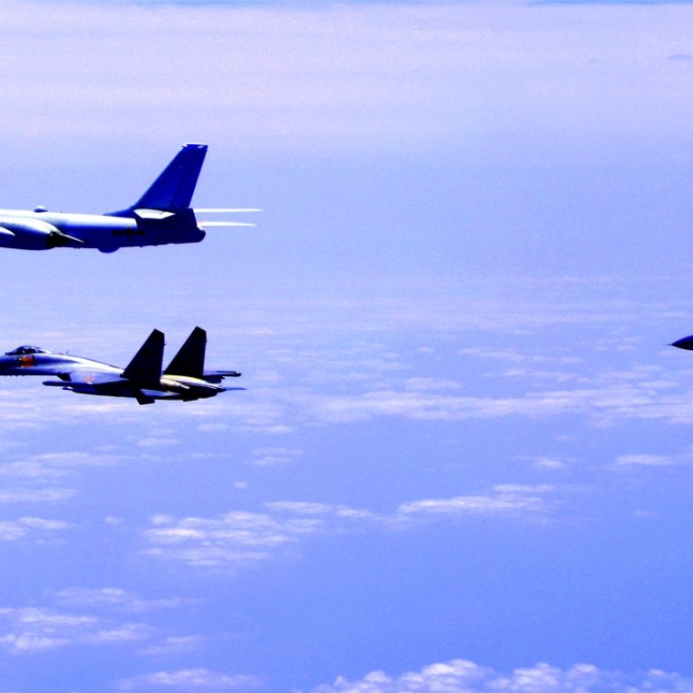 An H-6K bomber takes part in this Chinese air force formation on April 19. Similar formations conducted island patrols recently during a training exercise with an aim of improving the ability to safeguard national sovereignty, an air force representative confirmed Thursday. Photo: Xinhua