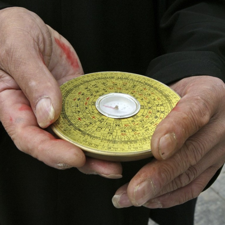 Chinese feng shui master held at knifepoint over ‘vile’ funeral date