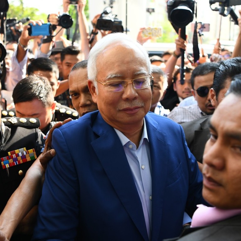 Malaysia's Najib Razak faces '20 years in jail' as court ...