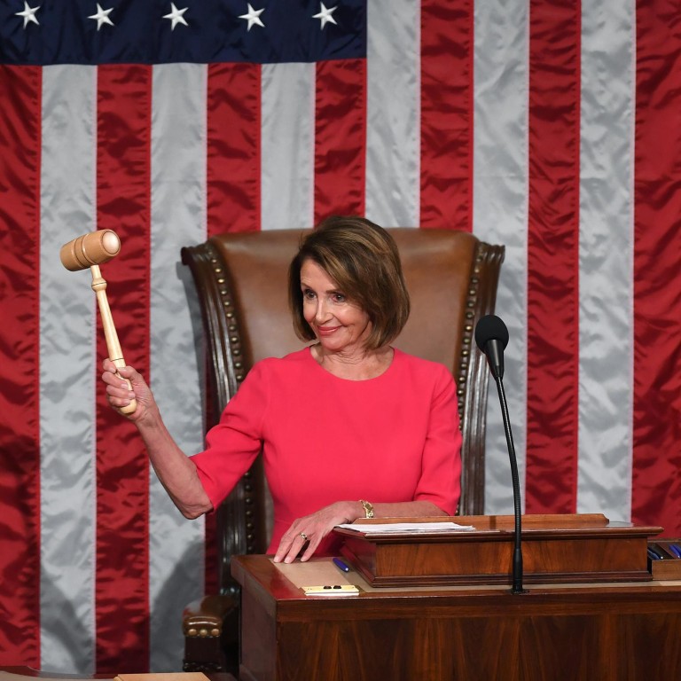 Speaker of the House Nancy Pelosi holds up the gavel as the 116th Congress convenes. Photo: The Washington Post