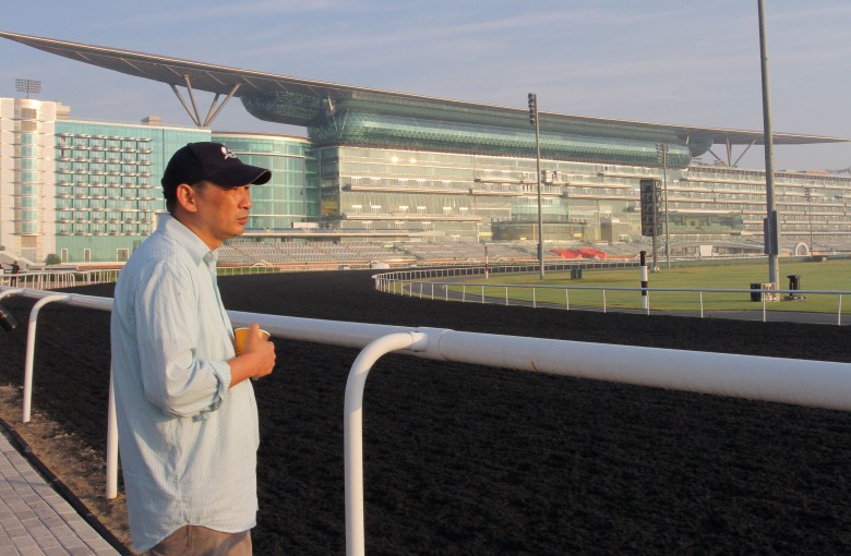 Michael Chang surveys Meydan in 2014, before Rich Tapestry's second in the Golden Shaheen. He returns this year with a very strong chance of going one better on the newly laid dirt surface. Photos: Kenneth Chan