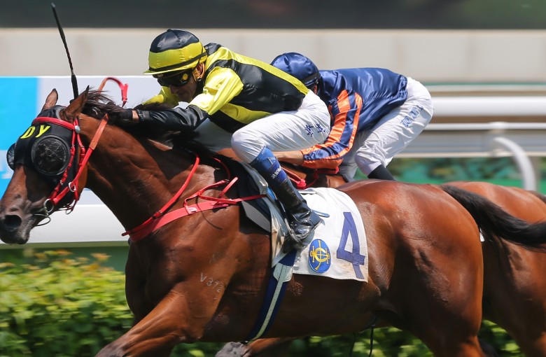 Douglas Whyte pushes Dukedom over the line at Sha Tin on Sunday. Photos: Kenneth Chan