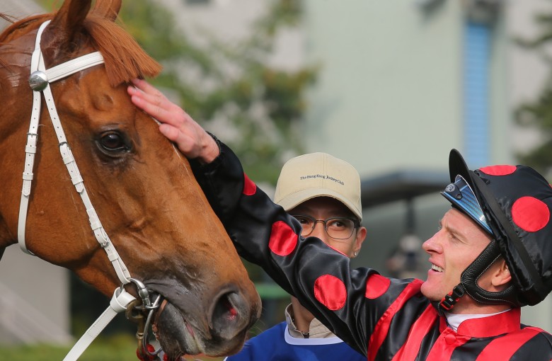 Zac Purton gives Time Warp a pat after their victory in the Citi Hong Kong Gold Cup at Sha Tin on February 18. Photos: Kenneth Chan