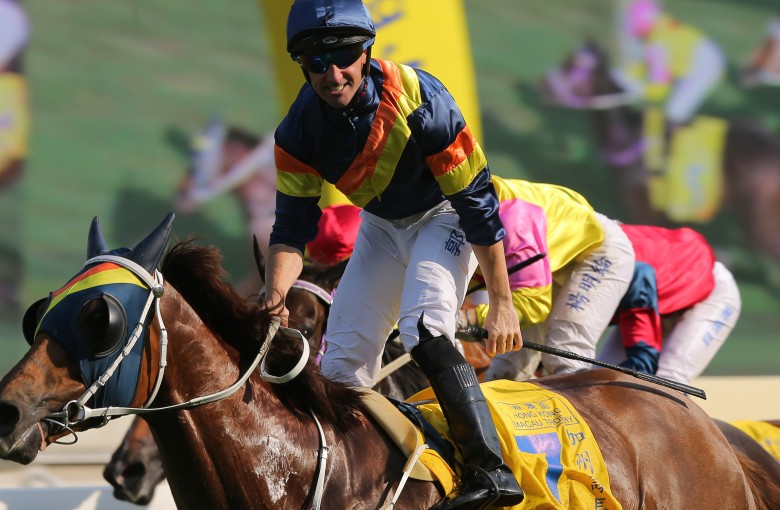 A jubilant Neil Callan salutes on California Whip. Photos: Kenneth Chan