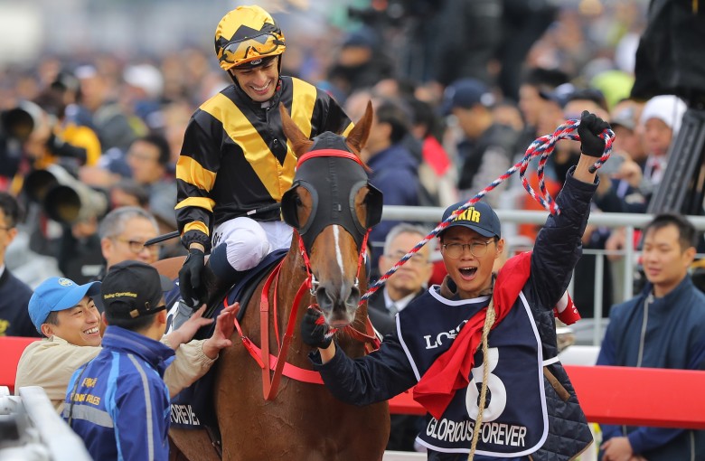 Glorious Forever and Silvestre de Sousa are led back by a happy mafoo after their Longines Hong Kong Cup victory. Photos: Kenneth Chan