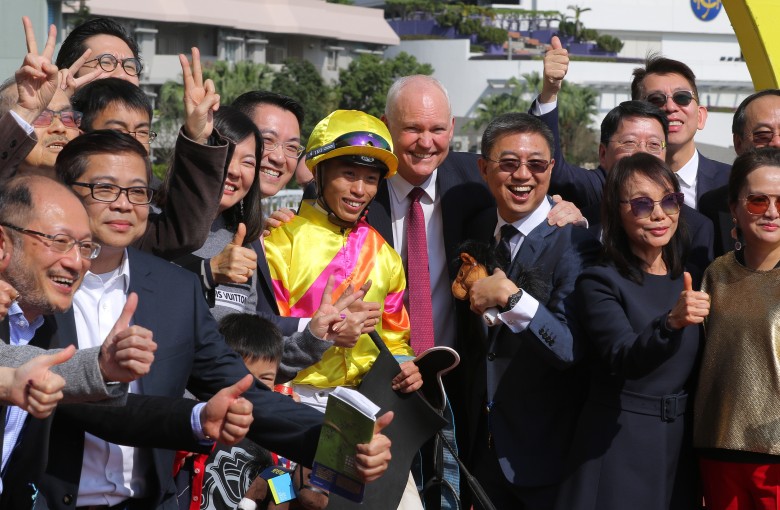 Ho Ho Khan’s connections are all smiles after his victory at Sha Tin on Sunday. Photos: Kenneth Chan