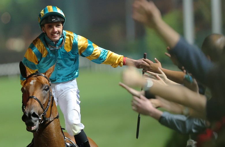 Martin Harley high fives the crowd after winning on Wednesday night. Photos: Kenneth Chan