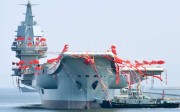 China's first domestically built aircraft carrier, the 50,000-tonne Shandong, is launched at a shipyard in the northeastern port city of Dalian. Photo: Kyodo