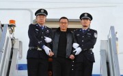 He Jian is arrested on November 7, 2017, after arriving in Beijing on a flight from Vancouver in this photo released by China's anti-graft agency, the CCDI. Photo: CCDI He Jian is arrested on November 7, 2017, after arriving in Beijing on a flight from Vancouver in this photo released by China's anti-graft agency, the CCDI. Photo: CCDI