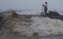 A Filipino fisherman near the shoreline in the town of Aparri, Cagayan province, which was set to take a battering from Mangkhut. Photo: EPA