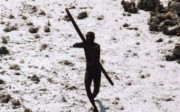 A Sentinelese tribesman takes aim with his bow at an Indian Coast Guard helicopter as it flies over North Sentinel Island in 2004. Members of one of the world's last tribes untouched by modern civilisation have killed an American who ventured illegally onto their remote island, Indian police have said. Photo: AFP / Indian Coast Guard / Survival International