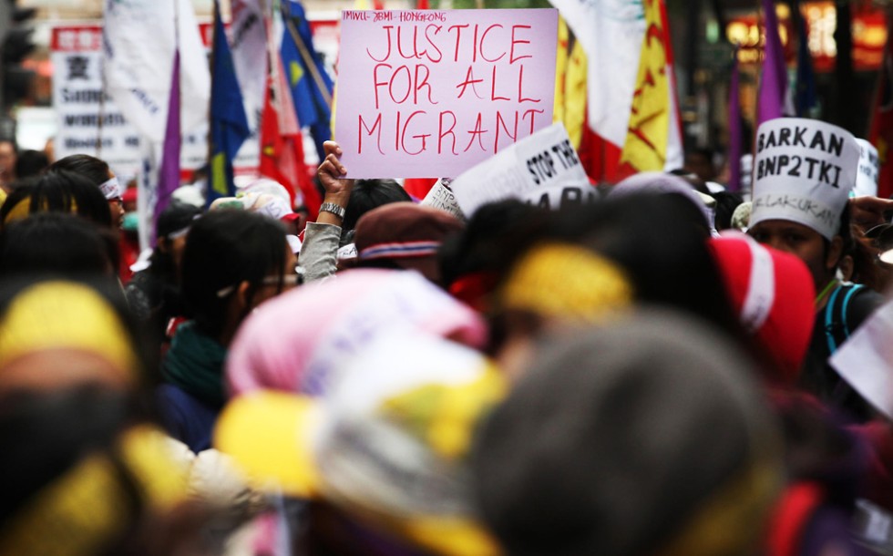 'We are workers, not slaves!' Hundreds of maids march on Hong Kong ...