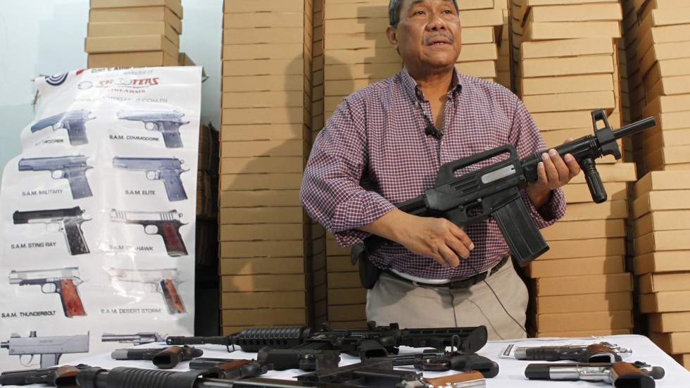 New Philippine law allows priests, journalists, lawyers to carry guns