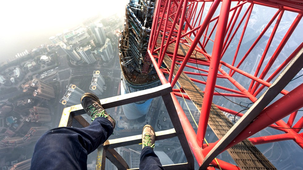 A perfect stunt Two Russian daredevils climb world’s second tallest