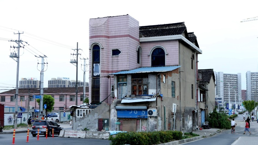 Notorious Shanghai 'nail house' in middle of road to be ...