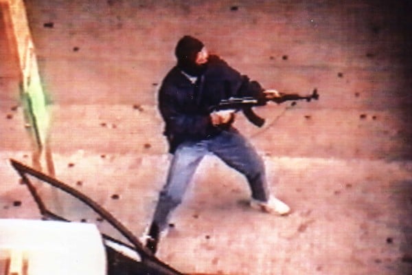 Armed robber Yip Kai-foon using an AK-47 in Hong Kong.
