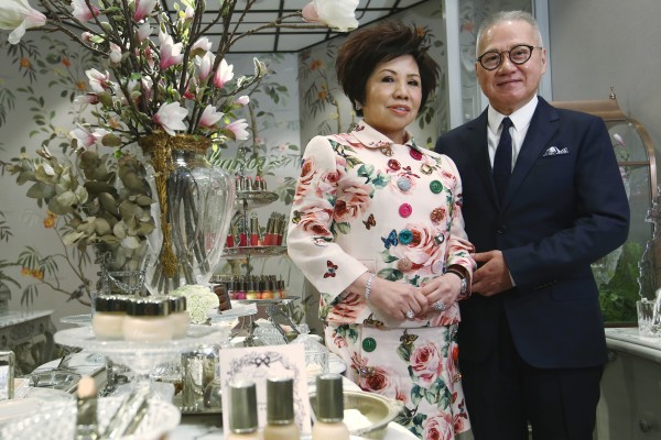 Simon Kwok, chairman and CEO of Sa Sa, with his wife, Eleanor, the firm’s vice-chairwoman, in Causeway Bay. Photo: Edmond So