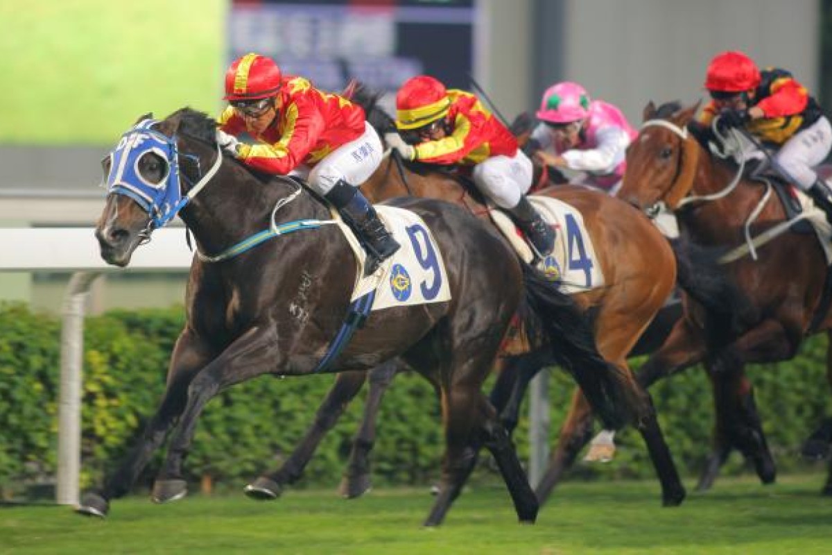 Fleet Command, left, ridden by Weichong Marwing, won the class 2 over 1400m at Sha Tin racecourse on Oct. 14, 2012. Photo: SCMP