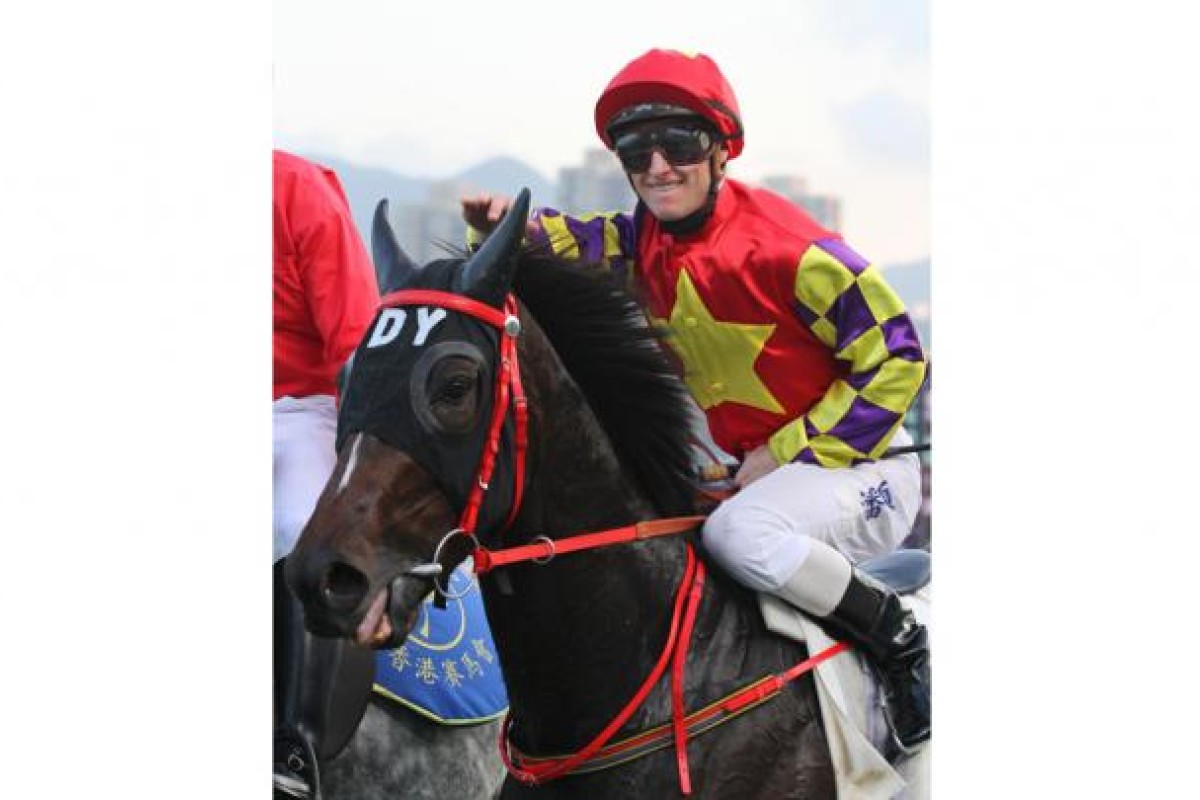 Zac Purton completes his double on impressive Winning Leader. Photo: Kenneth Chan