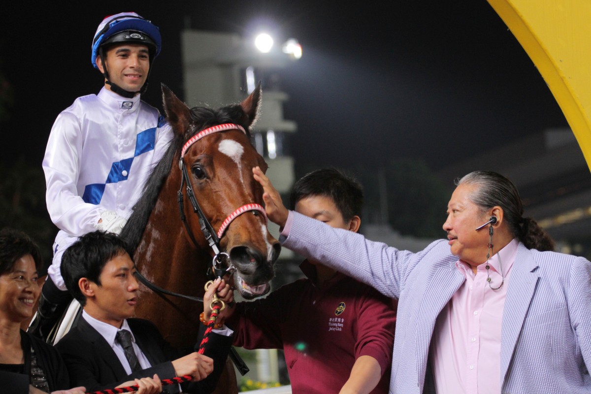 Amber Sky with owner Hung Kam Po and jockey Joao Moreira after Wednesday's impressive win. Photo: SCMP