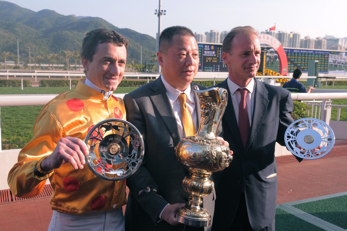 Jockey Douglas Whyte, owner Pan Sutong and trainer Richard Gibson celebrate Akeed Mofeed's Centenary Vase success. Photo: Kenneth Chan