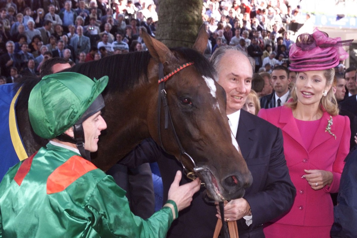 Irish jockey Johnny Murtagh holds Sinndar next to owner Aga Khan after winning the Prix de l'Arc de Triomphe in Paris in October 2000. Photo: AFP