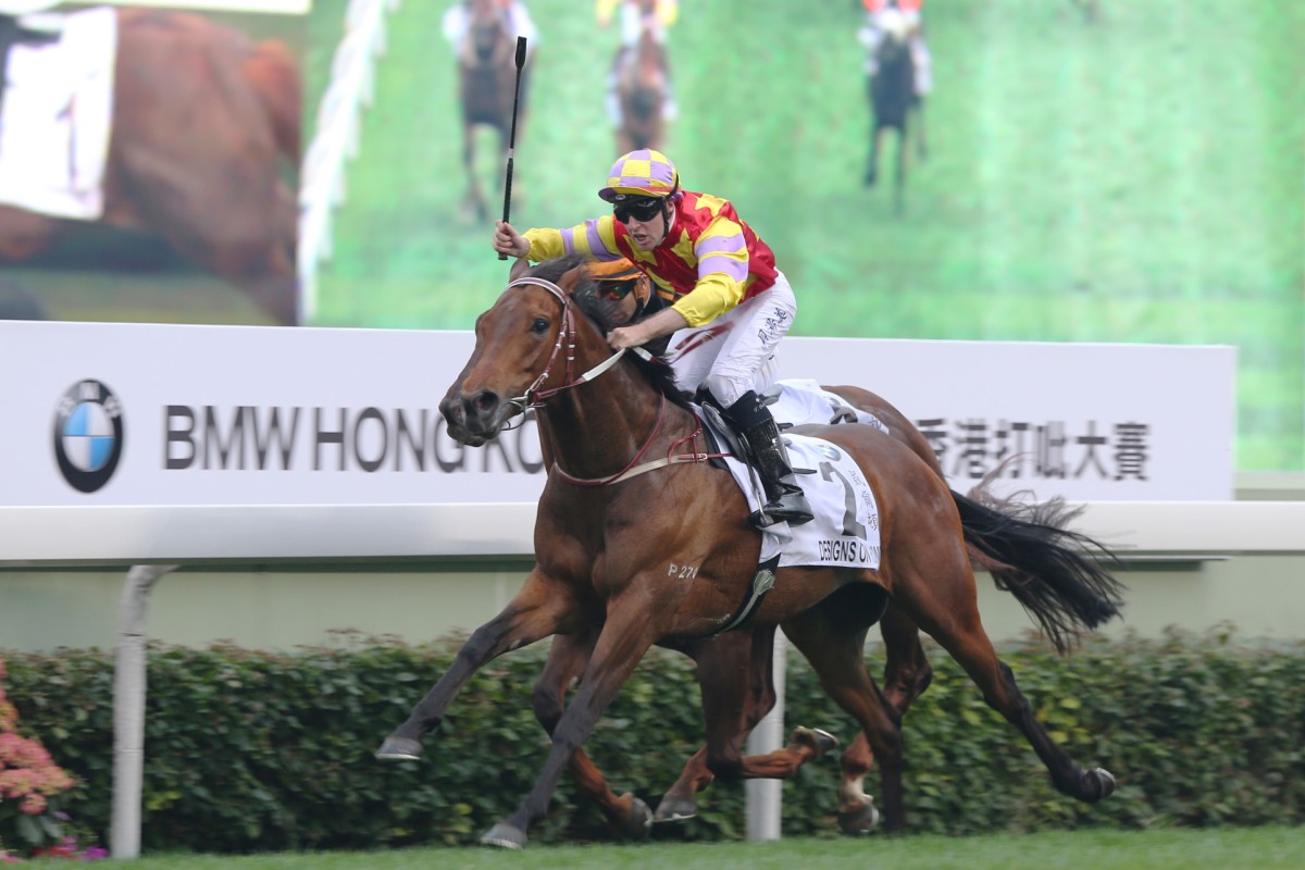 Designs on Rome (Tommy Berry) pulls away from Able Friend (Joao Moreira) to win the Hong Kong Derby. Photo: Kenneth Chan