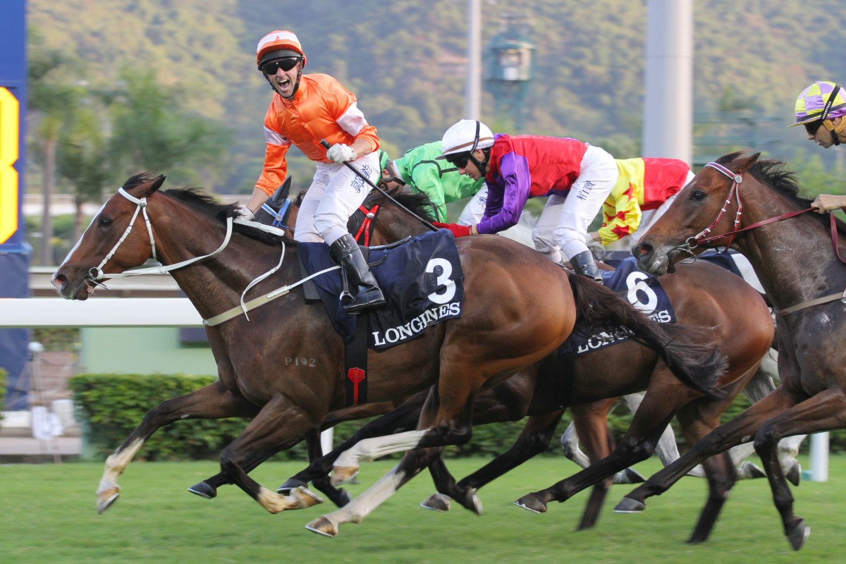 Neil Callan celebrates his Jockey Club Cup success on Blazing Speed. Photo: Kenneth Chan