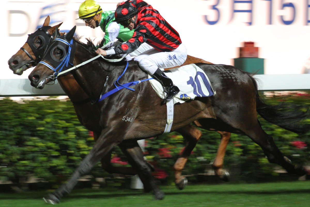 Zac Purton opens his account last night with a narrow victory on Joyeux on the outside, the first of his four winners. Photos: Kenneth Chan