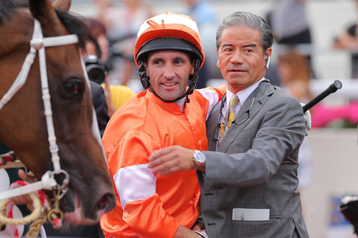 Neil Callan and Blazing Speed trainer Tony Cruz after the horse scored in the QE II Cup. Photos: Kenneth Chan