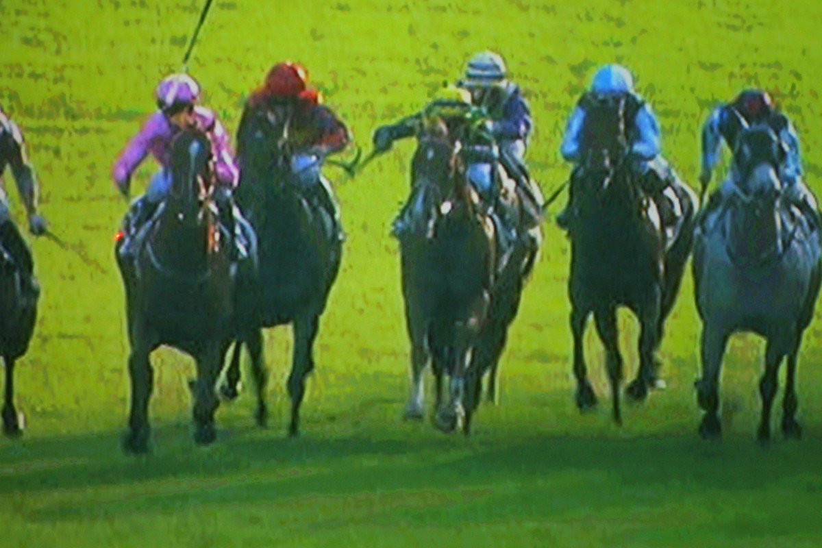 A freeze-frame sequence of Joao Moreira losing his whip from his right hand, before catching it in his left. Click right to view the sequence. Photo: Kenneth Chan