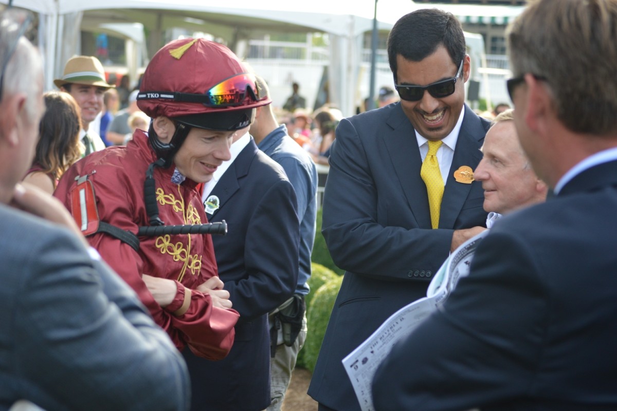 Jamie Spencer and Sheikh Fahad al-Thani share a joke at the Arlington Million in Chicago in August. The same weekend, the Qatari royal told Spencer his services as a jockey would no longer be required. Photo: SCMP Pictures