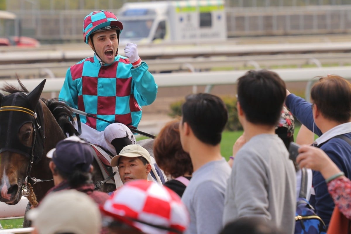 Leonardo Salles made a big splash by defeating fellow Brazilian Joao Moreira in a tight photo finish, winning aboard Energetic Class. Photo: Kenneth Chan