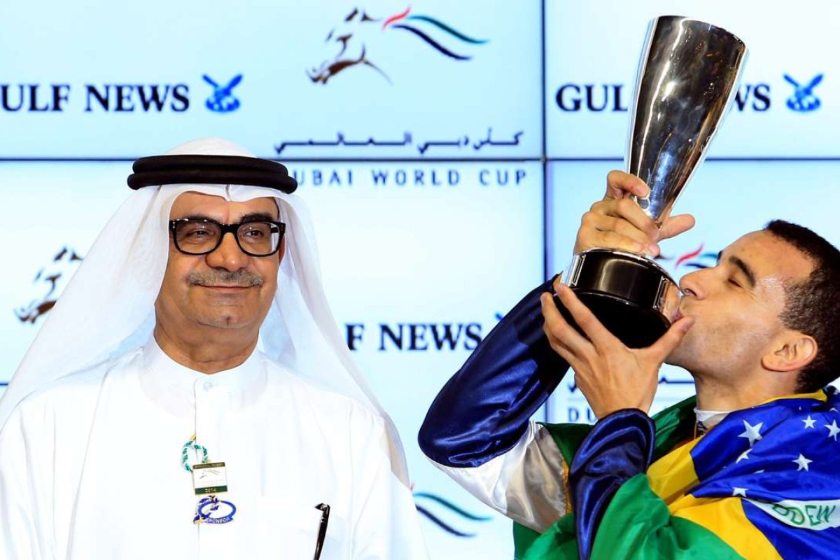 Joao Moreira (right), pictured draped in a Brazilian flag after winning the 2014 Golden Shaheen on Sterling City, could be Brazil’s next president with skills he has displayed in the politically tough Hong Kong racing environment. Photo: EPA