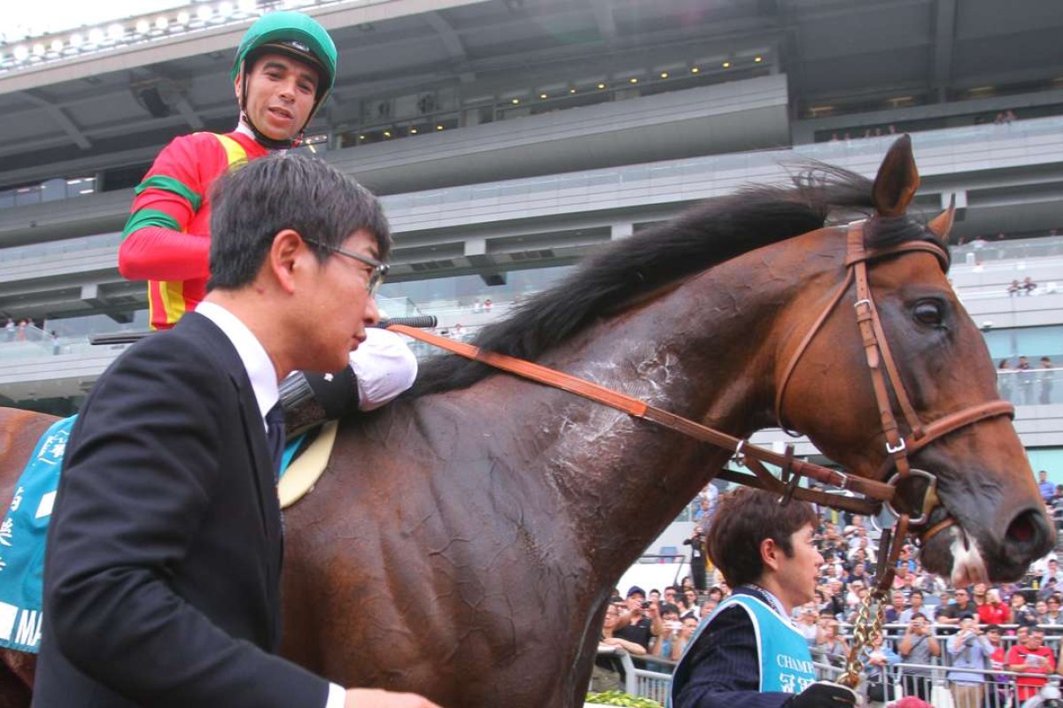Jockey Joao Moreira and trainer Noriyuki Hori dissect Maurice’s Champions Mile win last month. Photo: Kenneth Chan