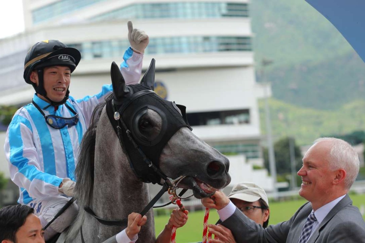 Ben So celebrates winning aboard Argentum to complete a double for trainer David Hall at Sha Tin on Friday. Photos; Kenneth Chan